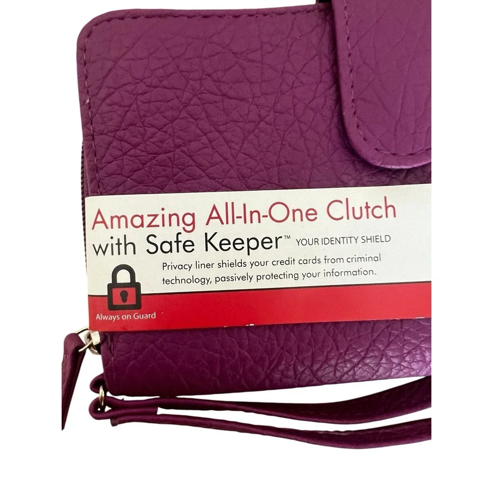 Mundi All In One Magenta Clutch Safe Keeper Zipper Photos Card Slots Wrist Strap